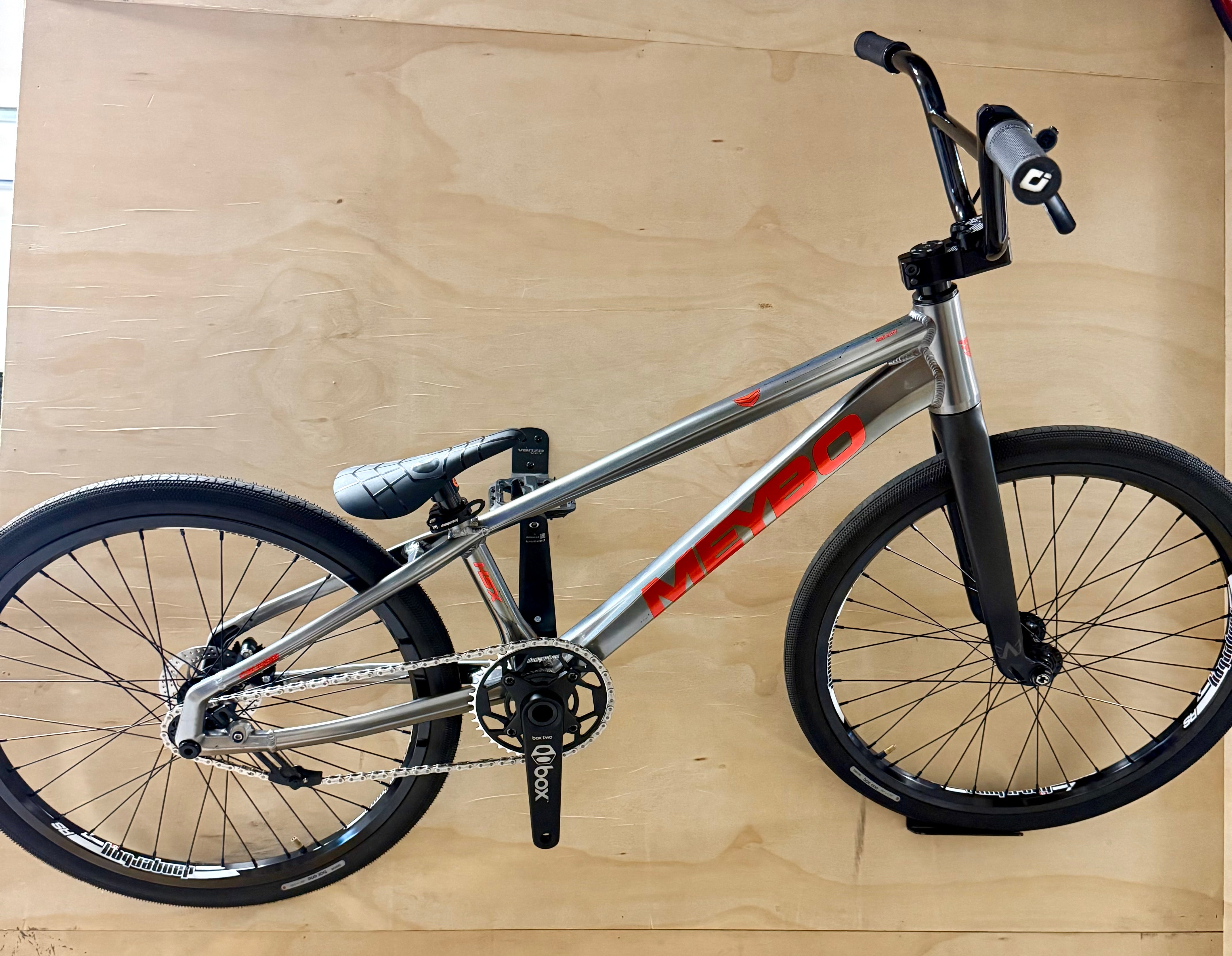 BMX bike on a wooden floor