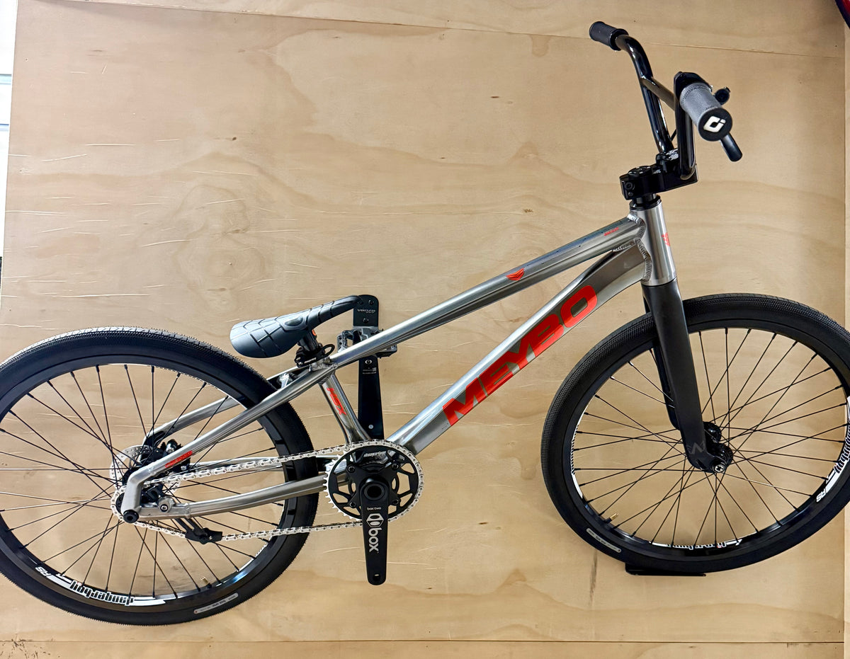 BMX bike on a wooden floor