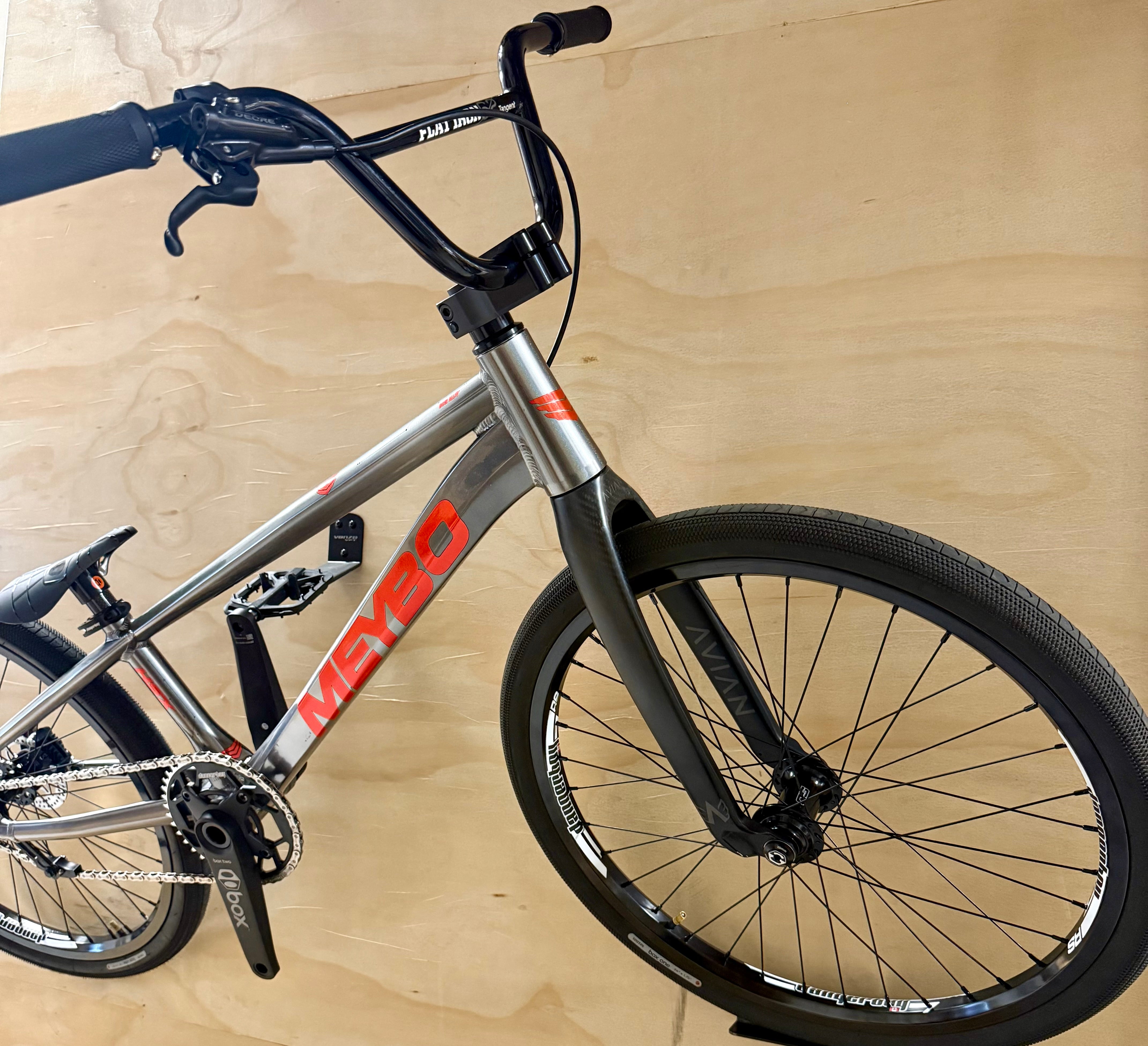 Meybo bicycle on a wooden floor